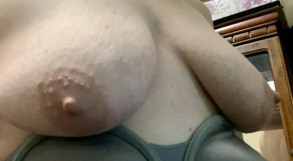 9P Wife putting on bra