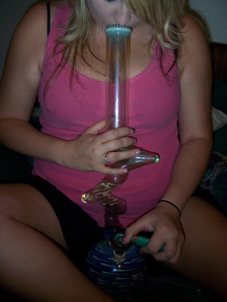 25P Blonde teen with massive boobs hit the bong