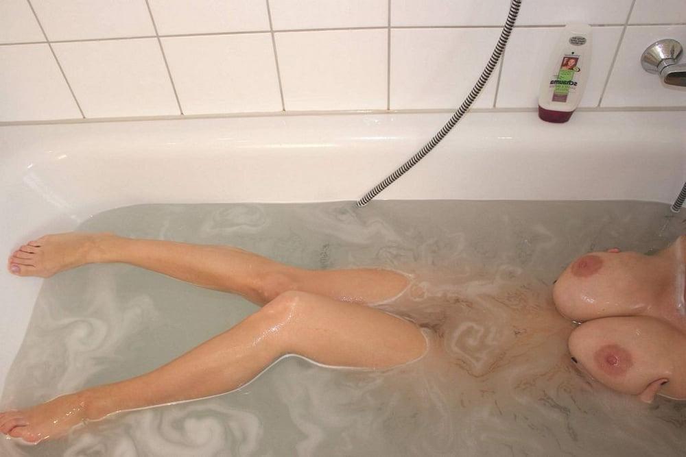 15P German busty babe wet in the shower