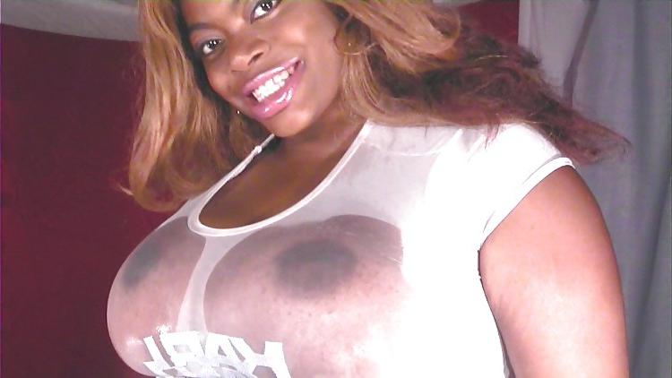 15P Sexy cam girl oils her huge boobs