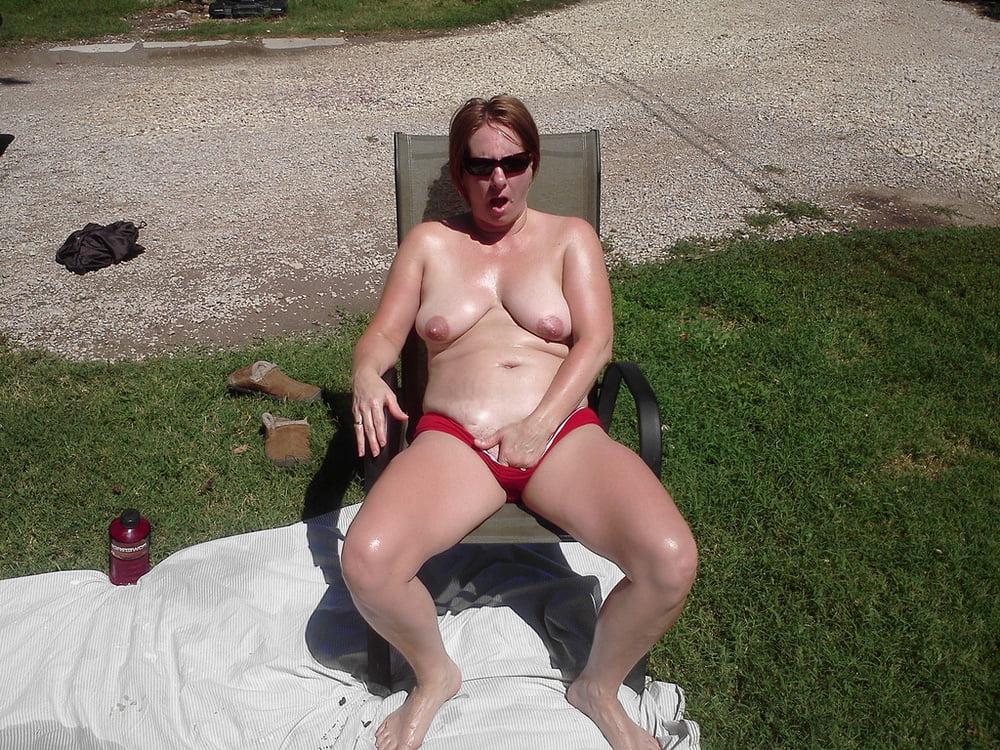 25P 5. Kansas wife poses for exposure.