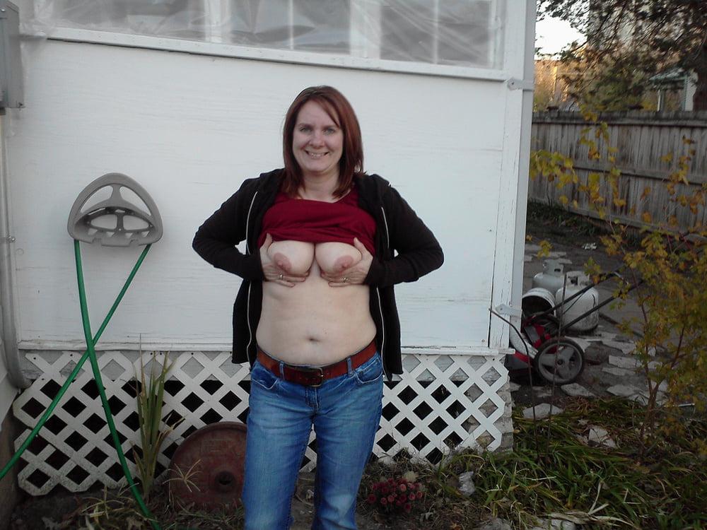 25P 5. Kansas wife poses for exposure.