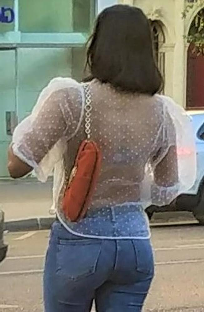 24P A french ebony girl pulling up her jeans !