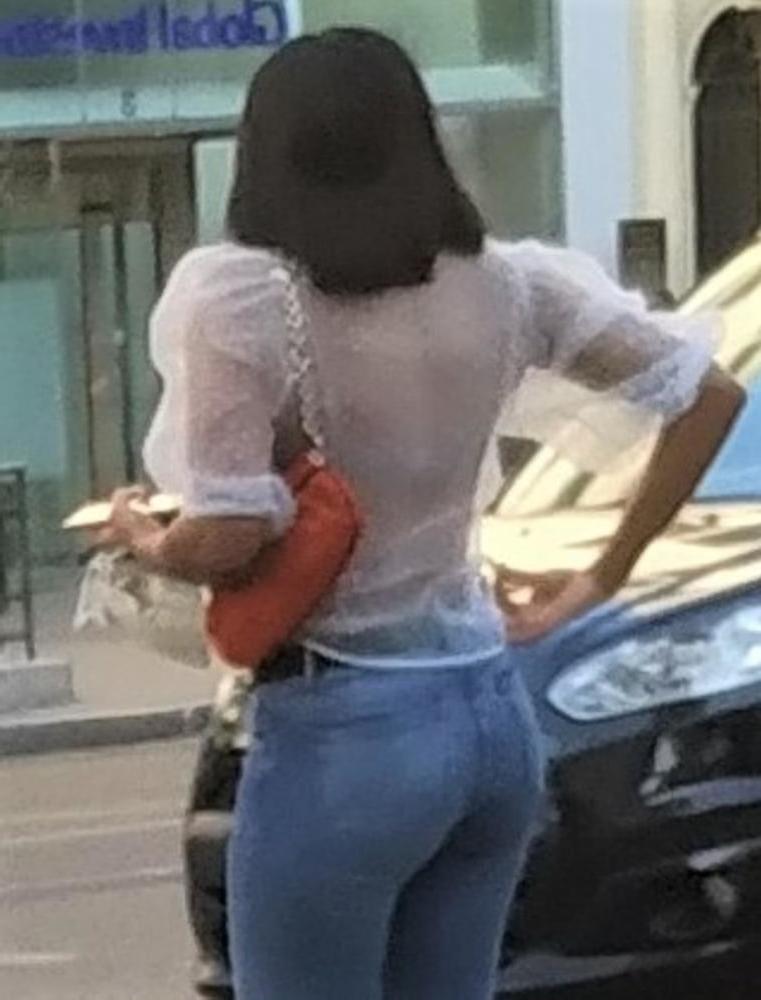 24P A french ebony girl pulling up her jeans !