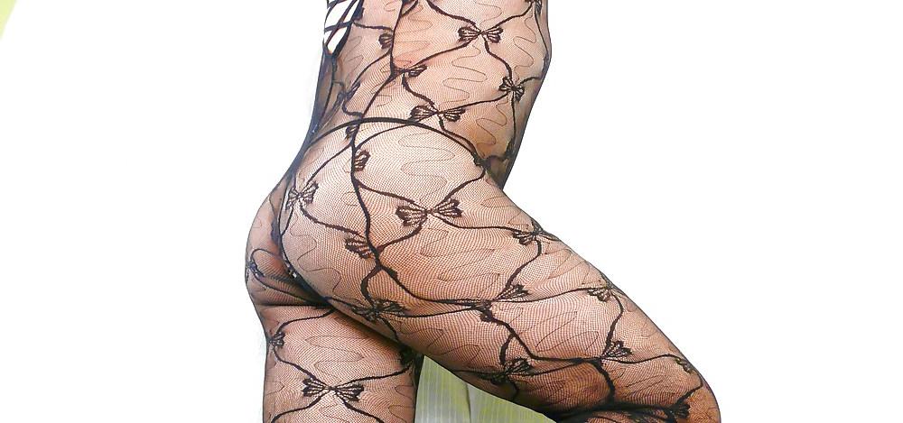 7P Sexy Crossdresser in Black Catsuit 02