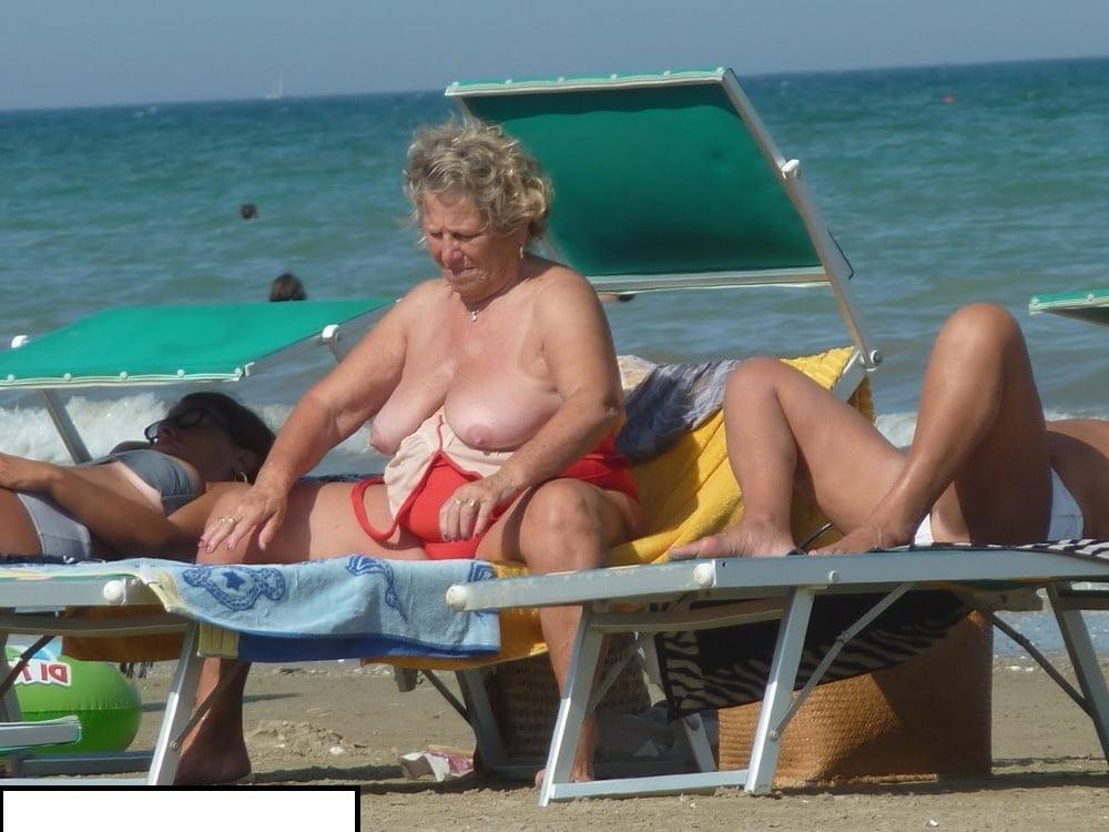 25P Granny big boobs beach 2