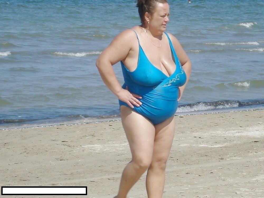25P Granny big boobs beach 2