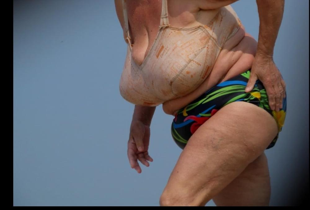 25P Granny big boobs beach 2