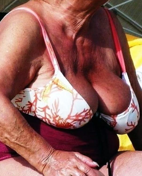 25P Granny big boobs beach 2