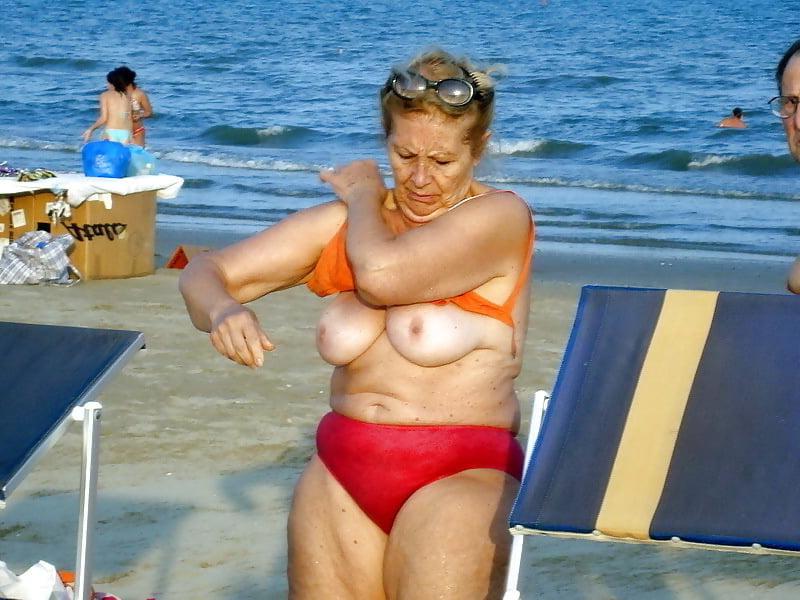 25P Granny big boobs beach 2