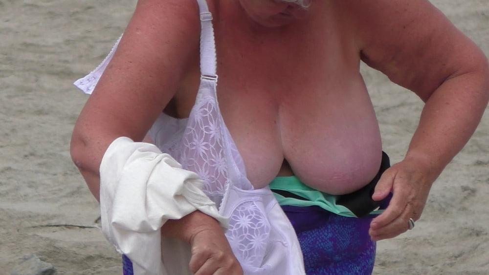 25P Granny big boobs beach 2