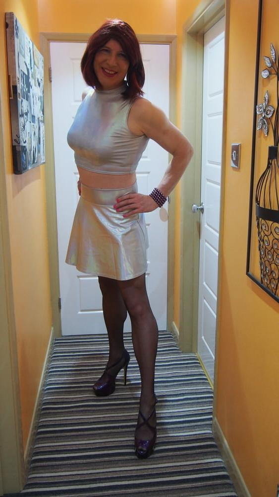 24P Sissy Lucy showing off her big cock in Silver skater skirt