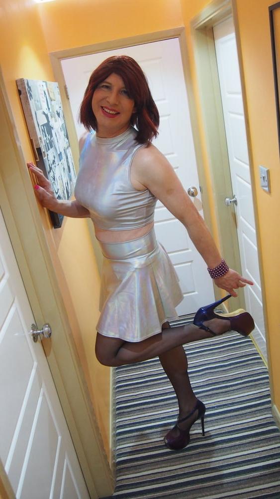 24P Sissy Lucy showing off her big cock in Silver skater skirt