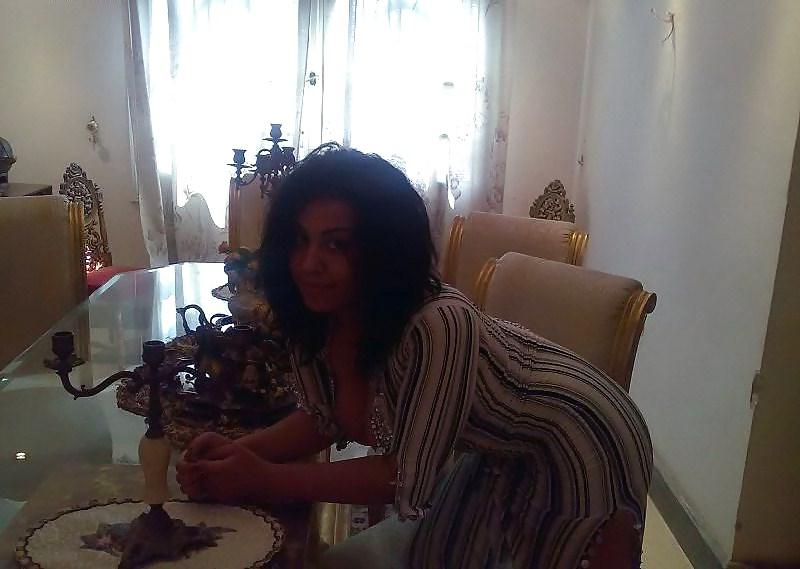 7P Egyptian woman showing big boobs and cleavage