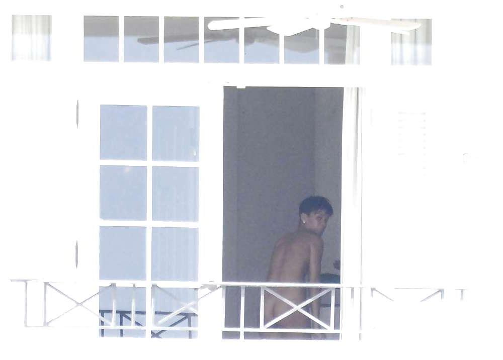 12P Rihanna Caught Naked Outside Her Balcony In Barbados 