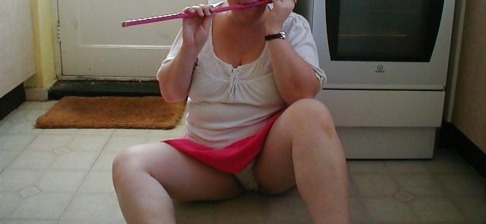 25P Panties up her pink skirts