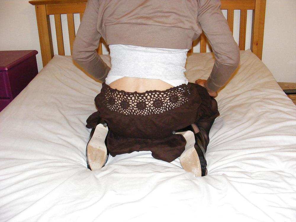 25P Stockings and heels on the bed