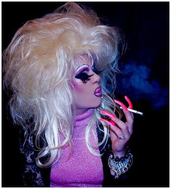 25P Smoking  glam transvestite with heavy make up