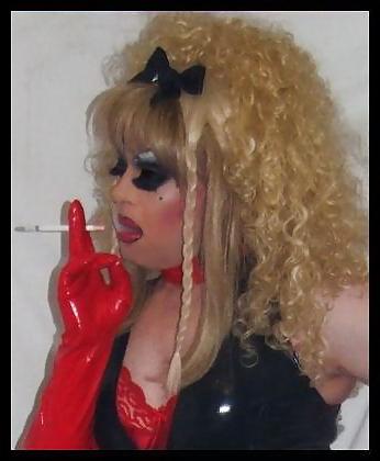 25P Smoking  glam transvestite with heavy make up