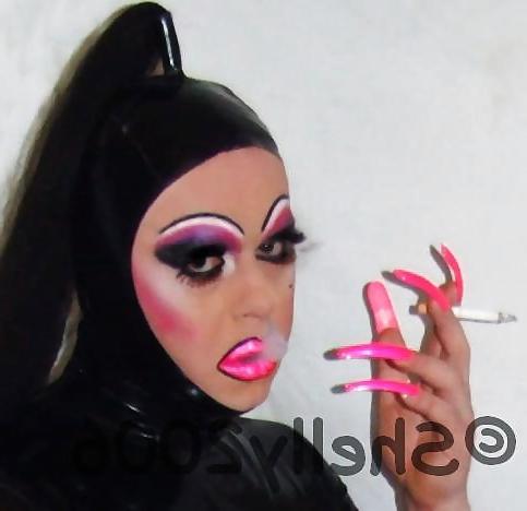 25P Smoking  glam transvestite with heavy make up