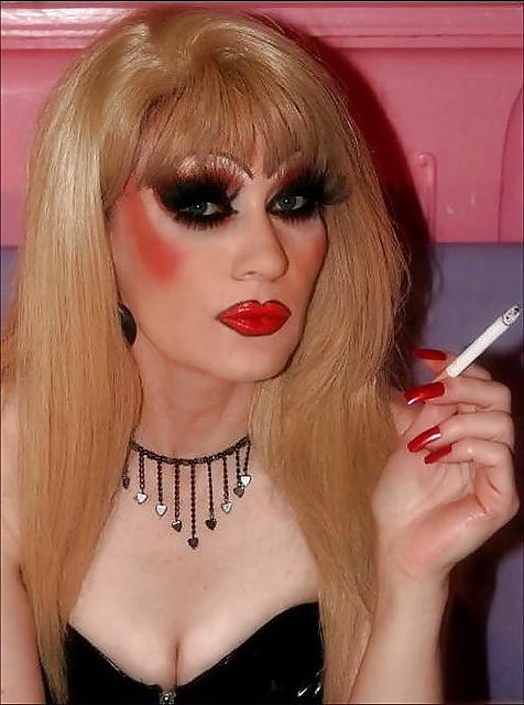 25P Smoking  glam transvestite with heavy make up