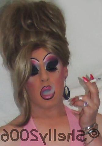 25P Smoking  glam transvestite with heavy make up