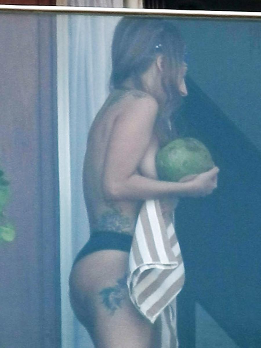 19P Lady Gaga Goes Nearly Nude on Hotel Balcony