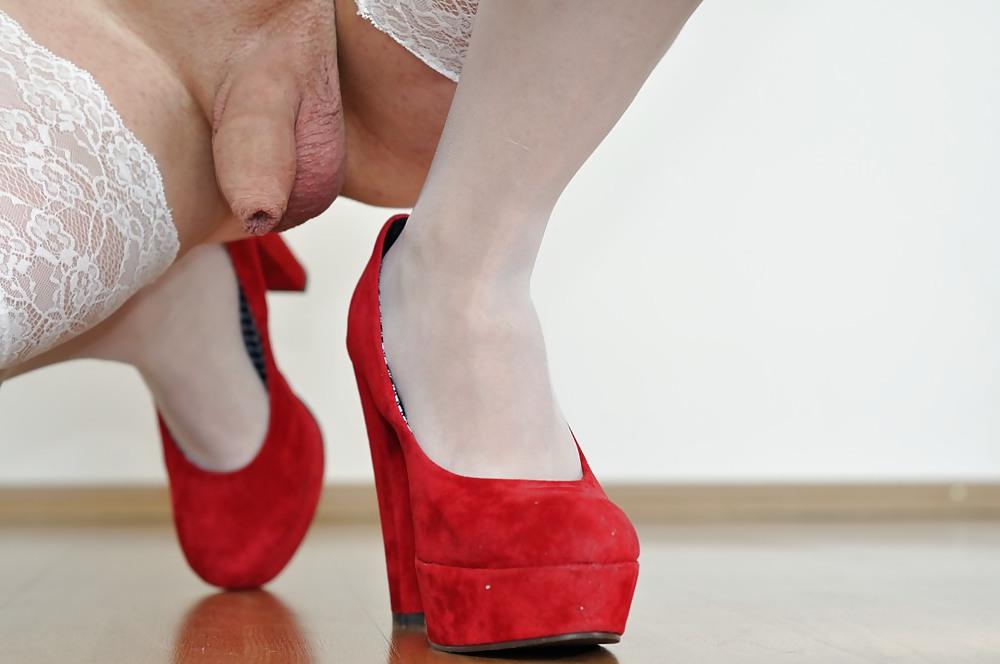 25P Crossdresser in stockings and red high heel pumps
