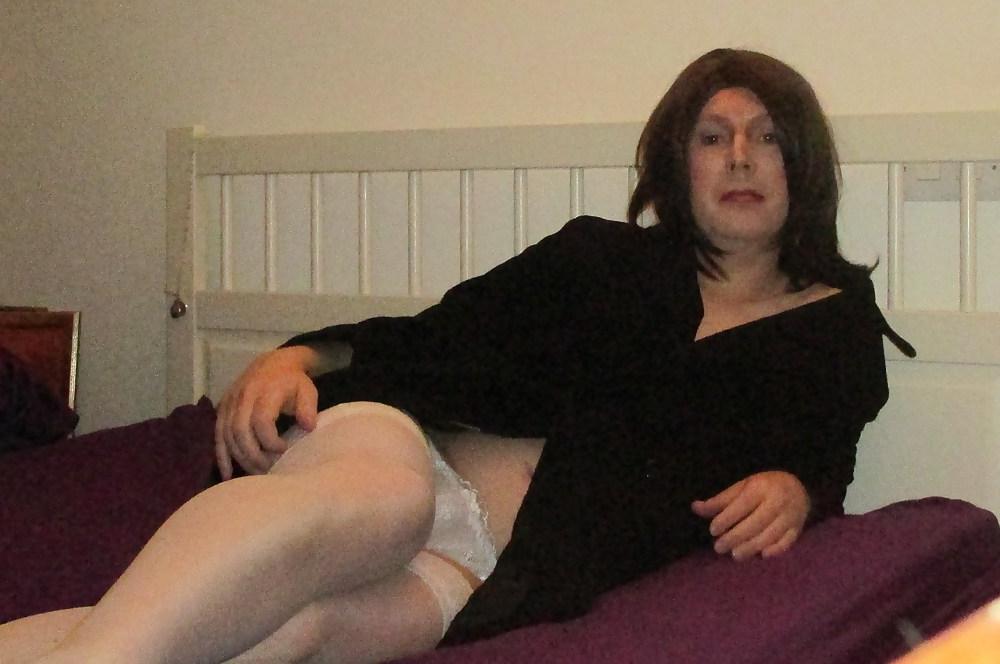 9P TS Emma Lee in white lingerie and stockings tease