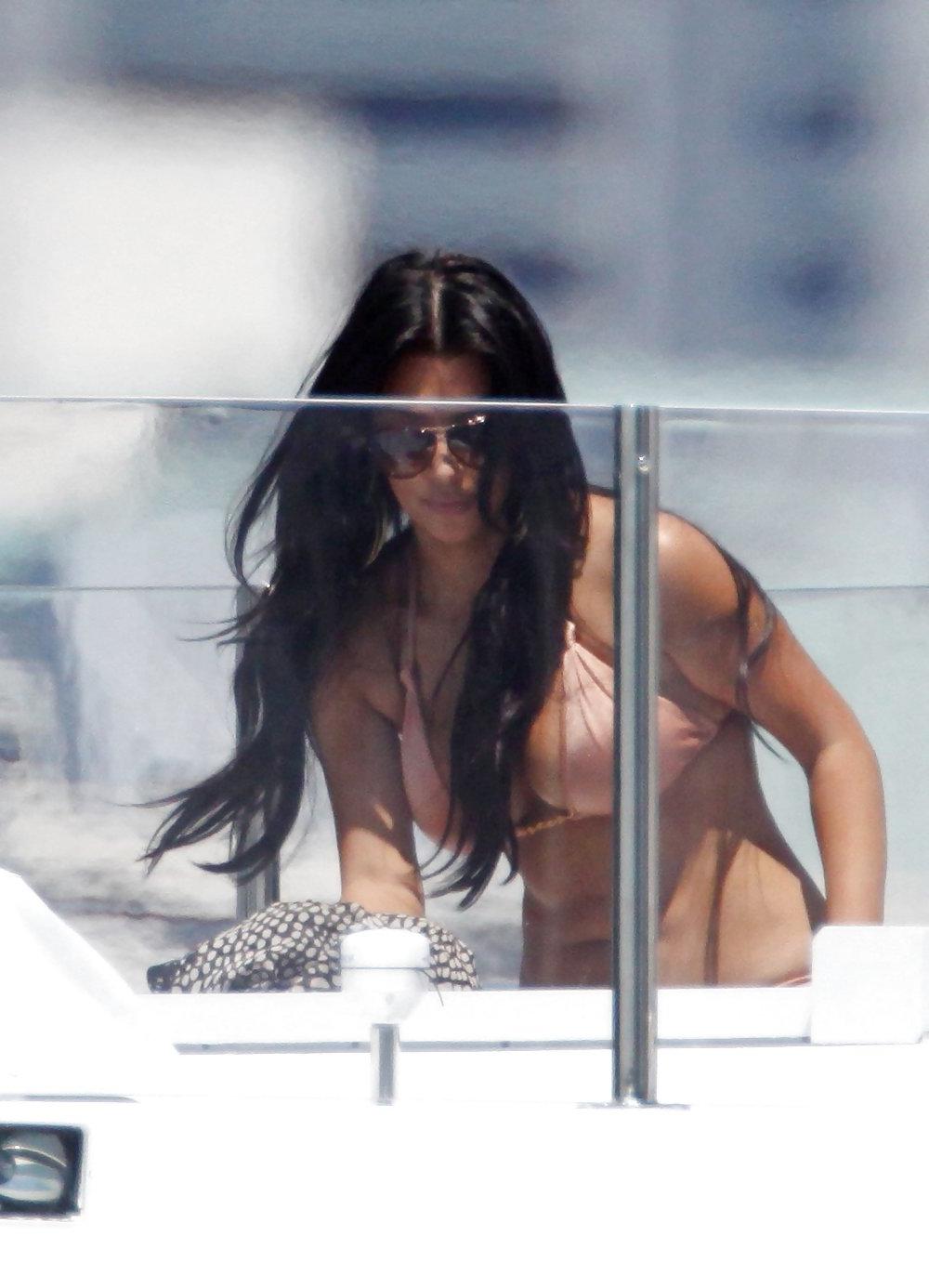 25P Kim Kardashian in Bikini on a Yacht in Miami