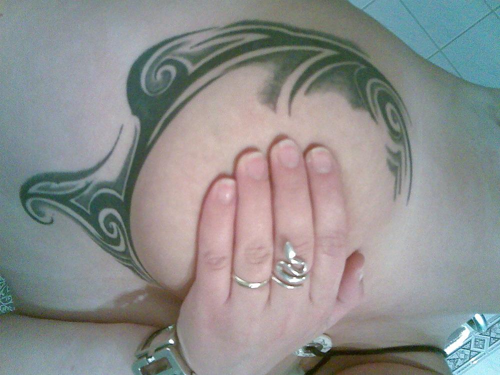 4P Me tattoo pierced