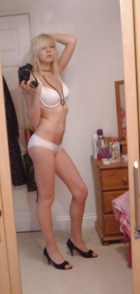 14P Cute Blonde with big boobs poses