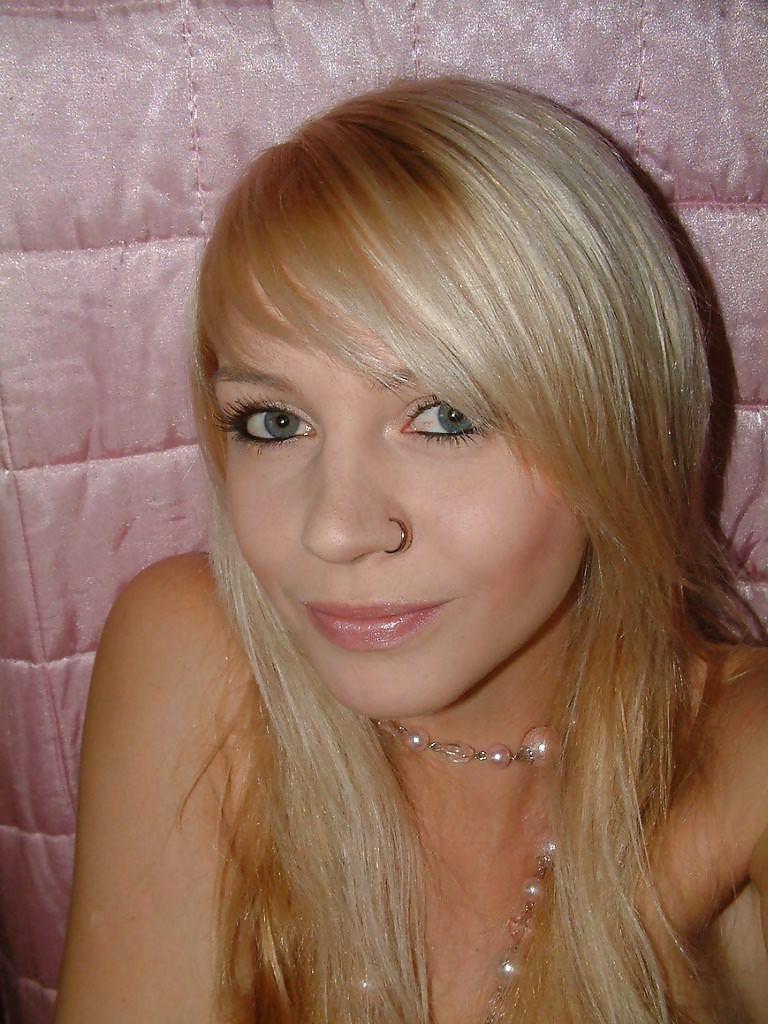 14P Cute Blonde with big boobs poses