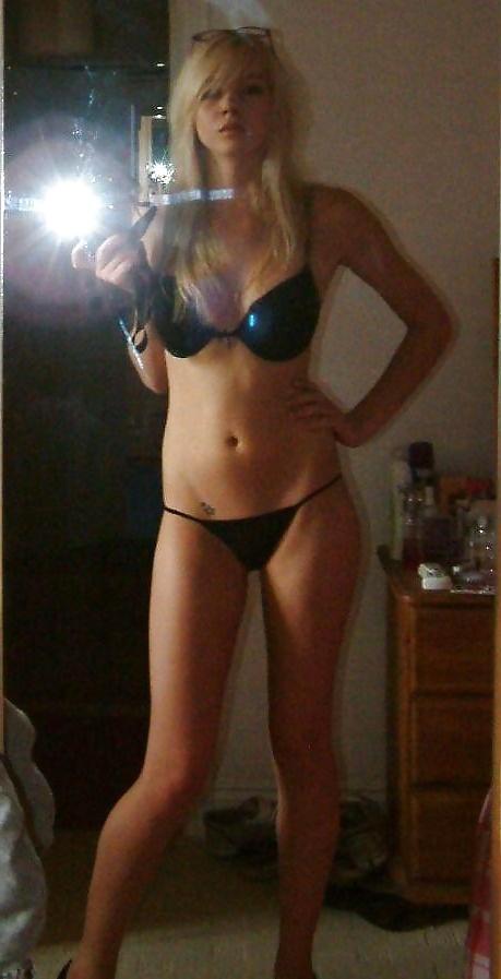 14P Cute Blonde with big boobs poses