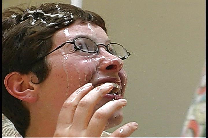 25P Nerdy brunette getting her face drenched by cum