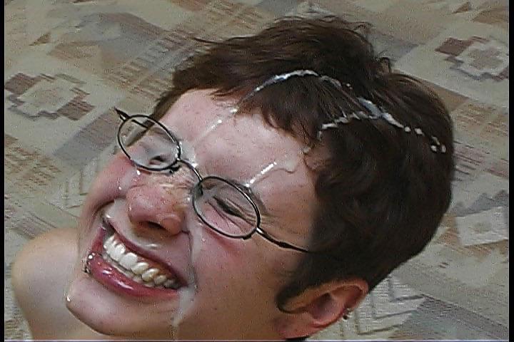 25P Nerdy brunette getting her face drenched by cum