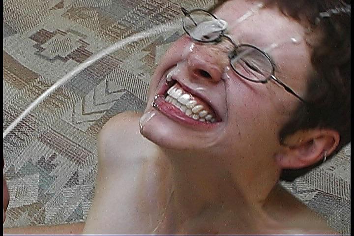 25P Nerdy brunette getting her face drenched by cum