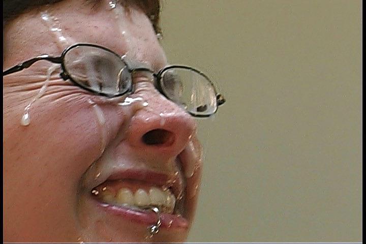 25P Nerdy brunette getting her face drenched by cum