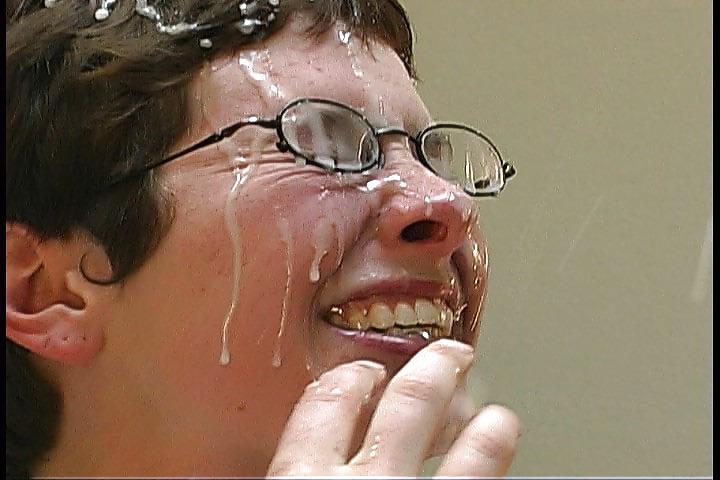25P Nerdy brunette getting her face drenched by cum