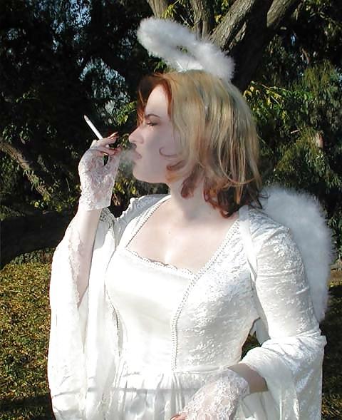 25P Erotic smoking women wearing gloves