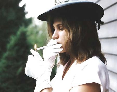 25P Erotic smoking women wearing gloves