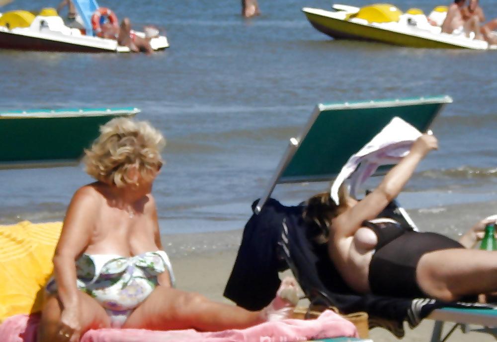 25P Beautiful mature women on the beach