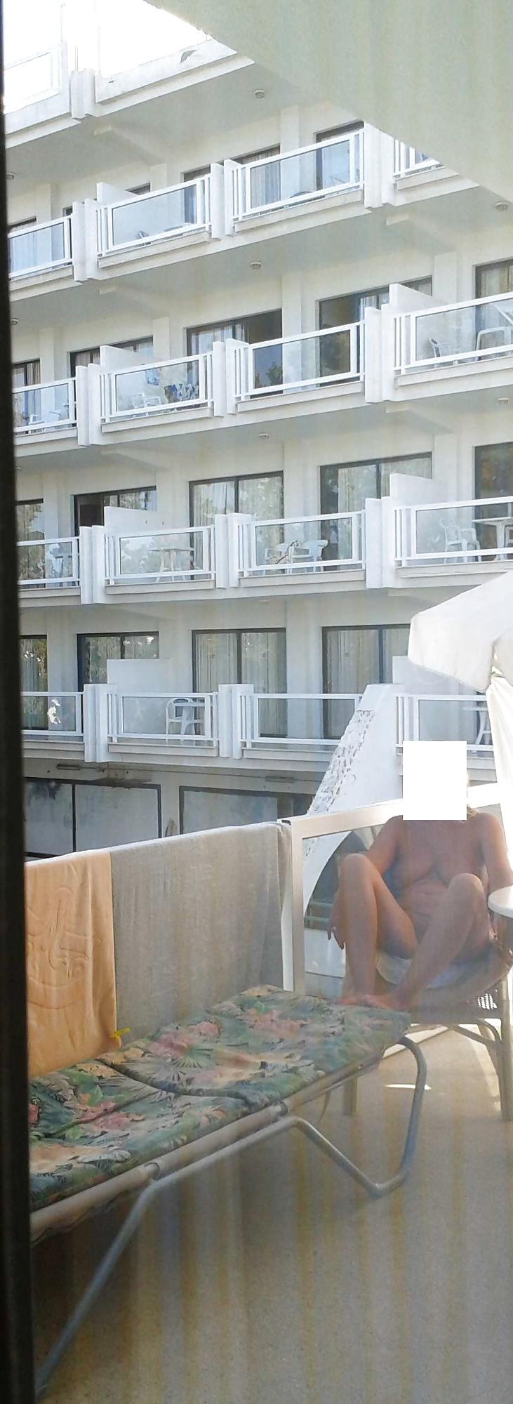16P Flashing nude on a hotel balcony