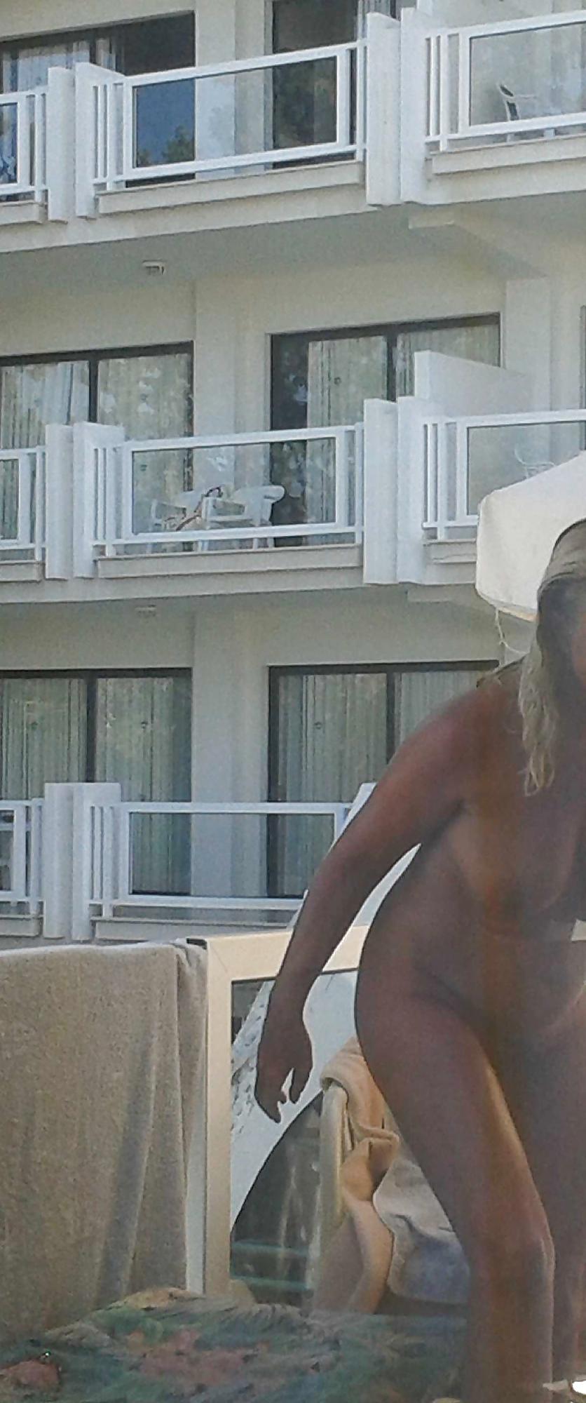 16P Flashing nude on a hotel balcony