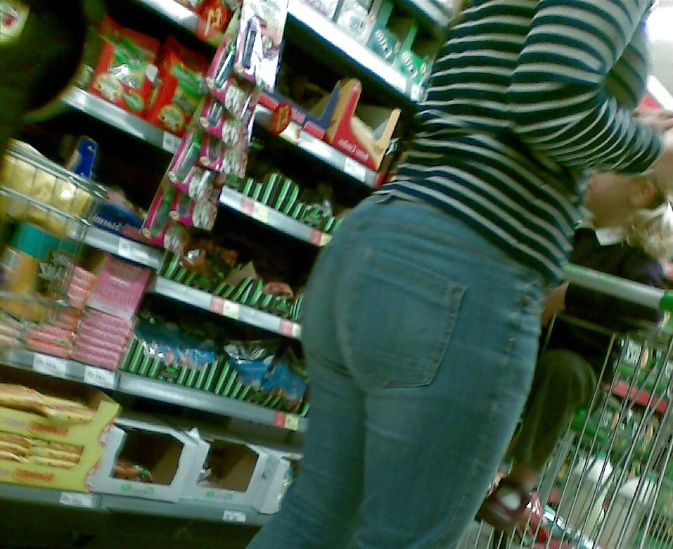 10P Sexy blonde MILF with big booty at the store