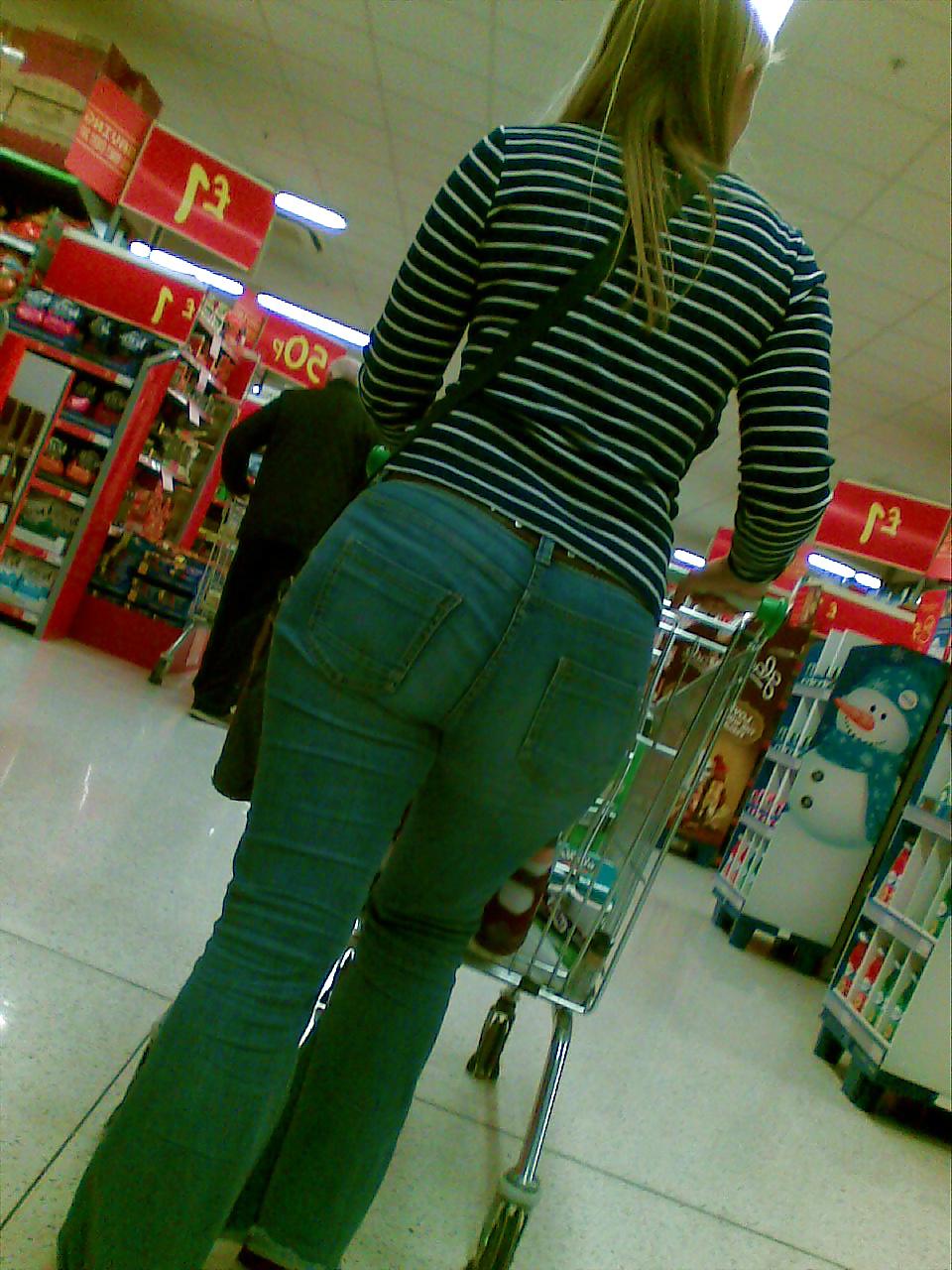 10P Sexy blonde MILF with big booty at the store