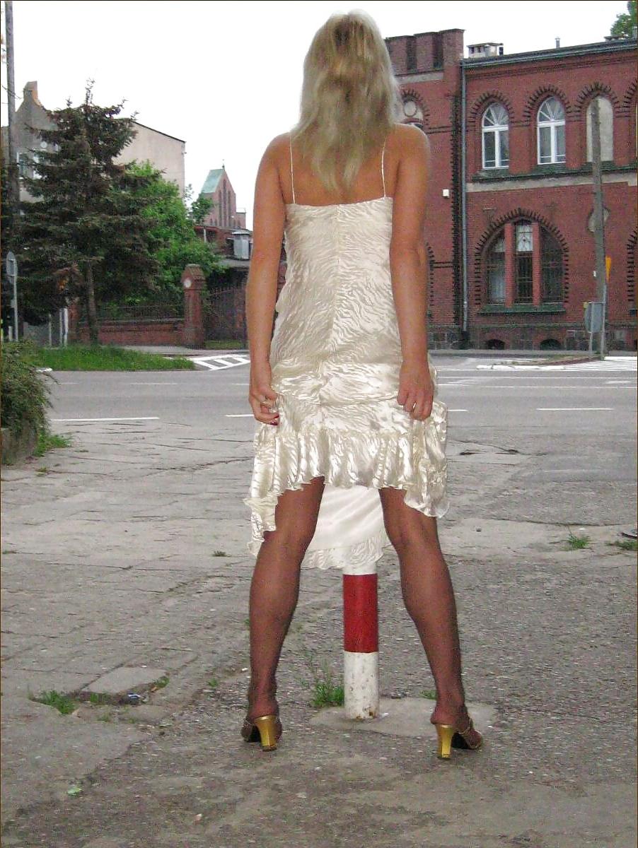 25P Blonde shows her legs in stockings 3