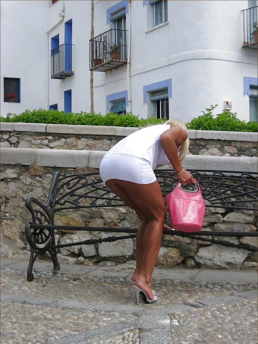 25P Blonde shows her legs in stockings 5