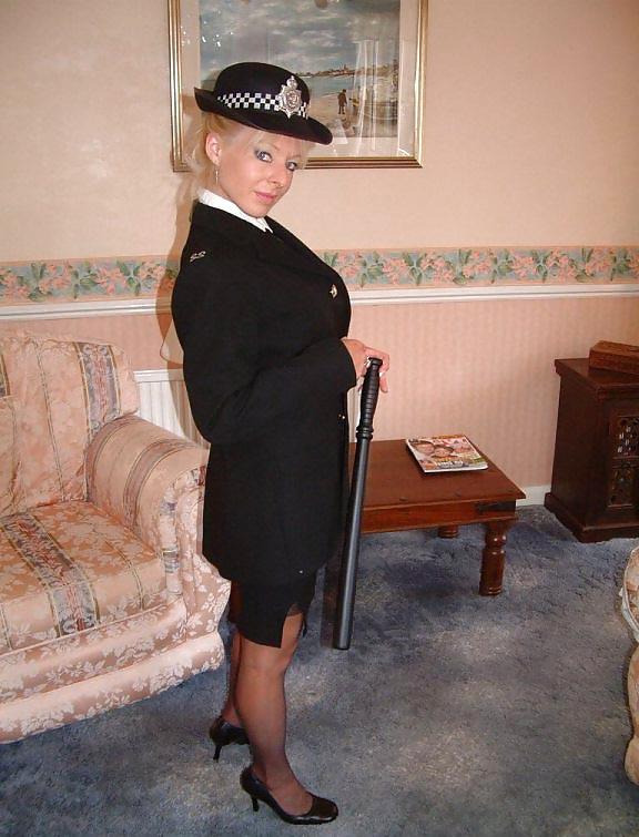 21P Blonde English lady dresses as police