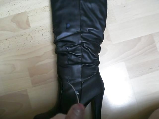 19P Cum on black boots